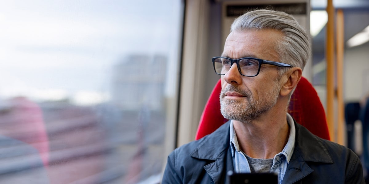 man travelling on train